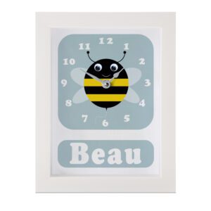 Personalised Children's Clock featuring a bee with googly eyes.