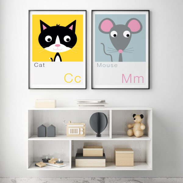 Cat and mouse prints framed on a childs bedroom wall