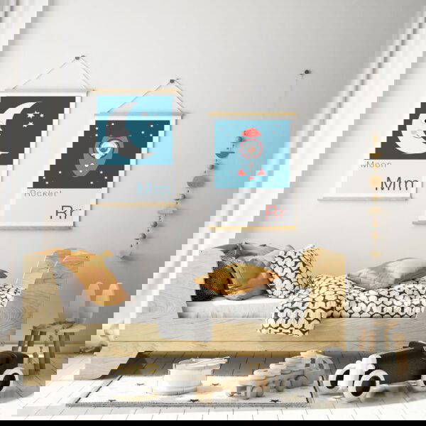 Moon Rocket Children's Print moon and rocket kids prints hung up on wall of bedroom