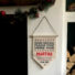 father Christmas stop here sign hung up by the fireplace personalised with a name