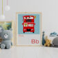 Cute Animal Alphabet nursery print featuring a london Bus with animals aboard