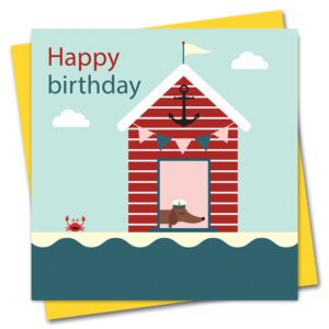 seaside beach hut birthday card with a sausage dog